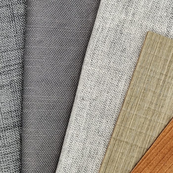 Close,Up,View,Of,Grey,Drapery,And,Wooden,Laminated,Samples